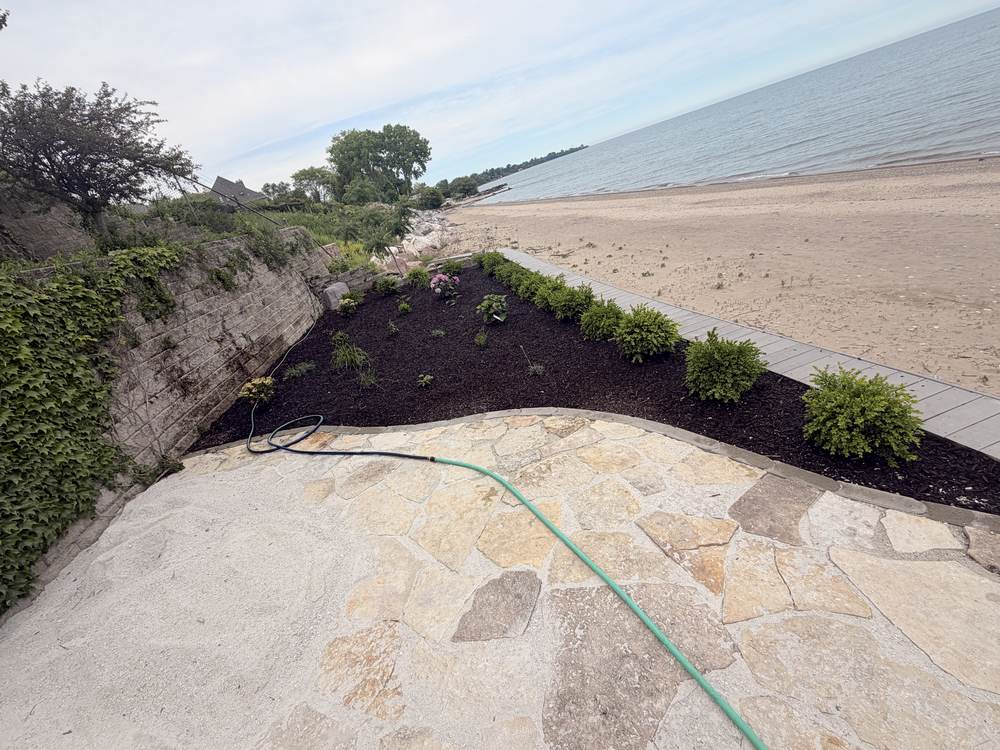 Flagstone patio & new border — Racine, WI